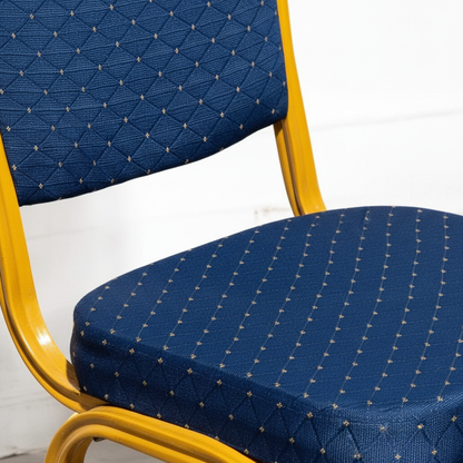 Banquet chair with blue upholstery and gold frame - detail view